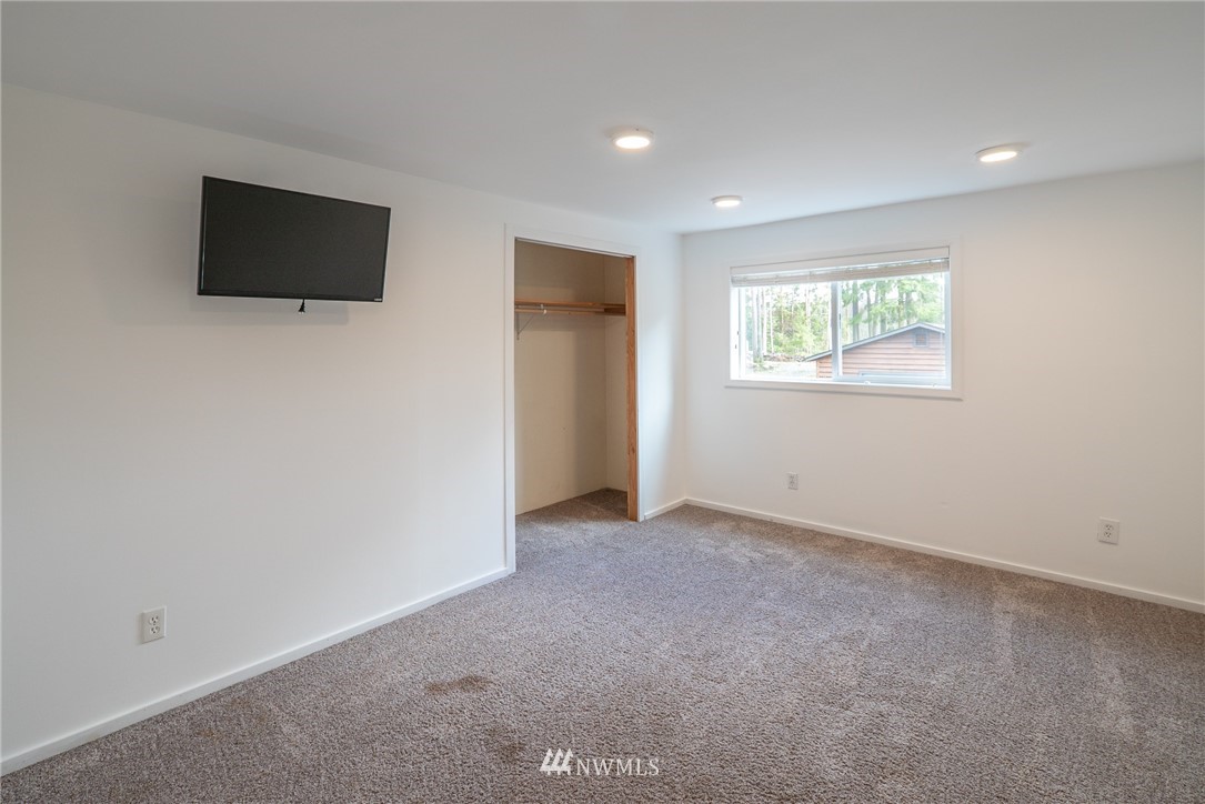 3399 East Harbor Road Langley, WA 98260 - Photo 34 of 36 an empty room with windows