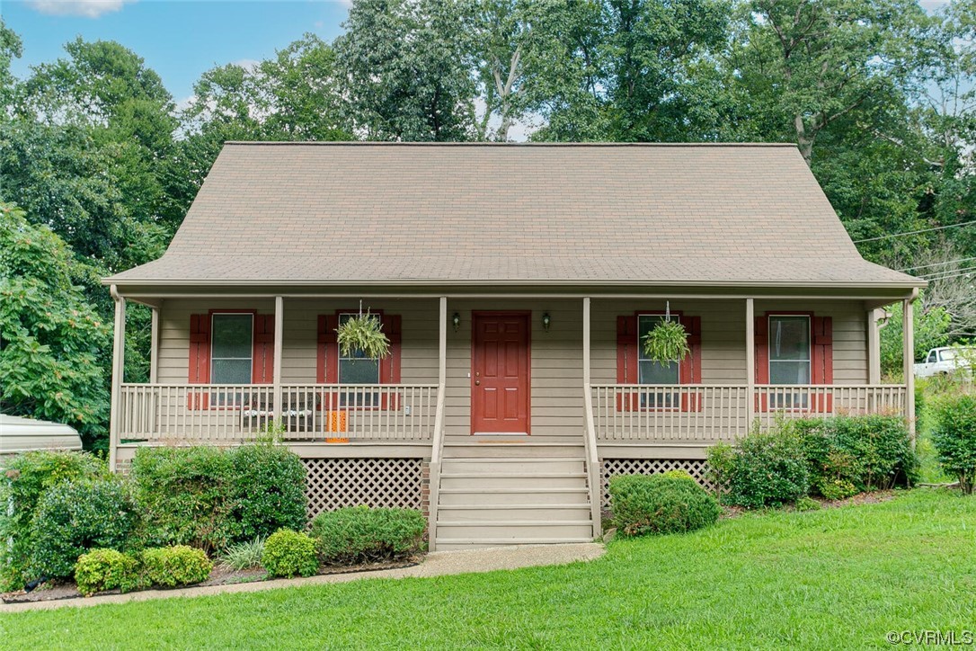 2125 Briarcliff Road Richmond, VA 23225 - Photo 1 of 27 View of front facade with a porch and a front yard