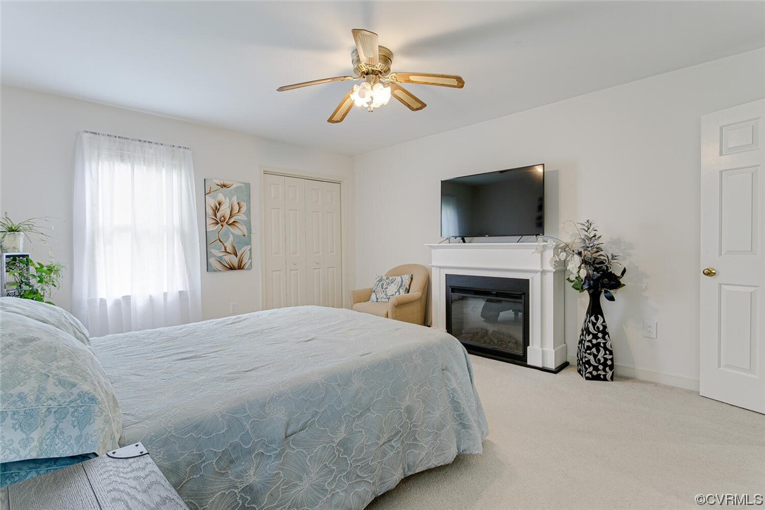2125 Briarcliff Road Richmond, VA 23225 - Photo 17 of 27 Carpeted bedroom featuring ceiling fan and a fireplace