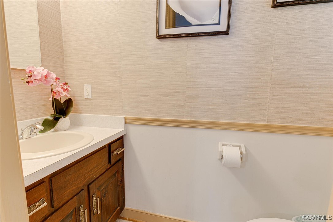 2125 Briarcliff Road Richmond, VA 23225 - Photo 18 of 27 Bathroom with vanity with extensive cabinet space and mirror