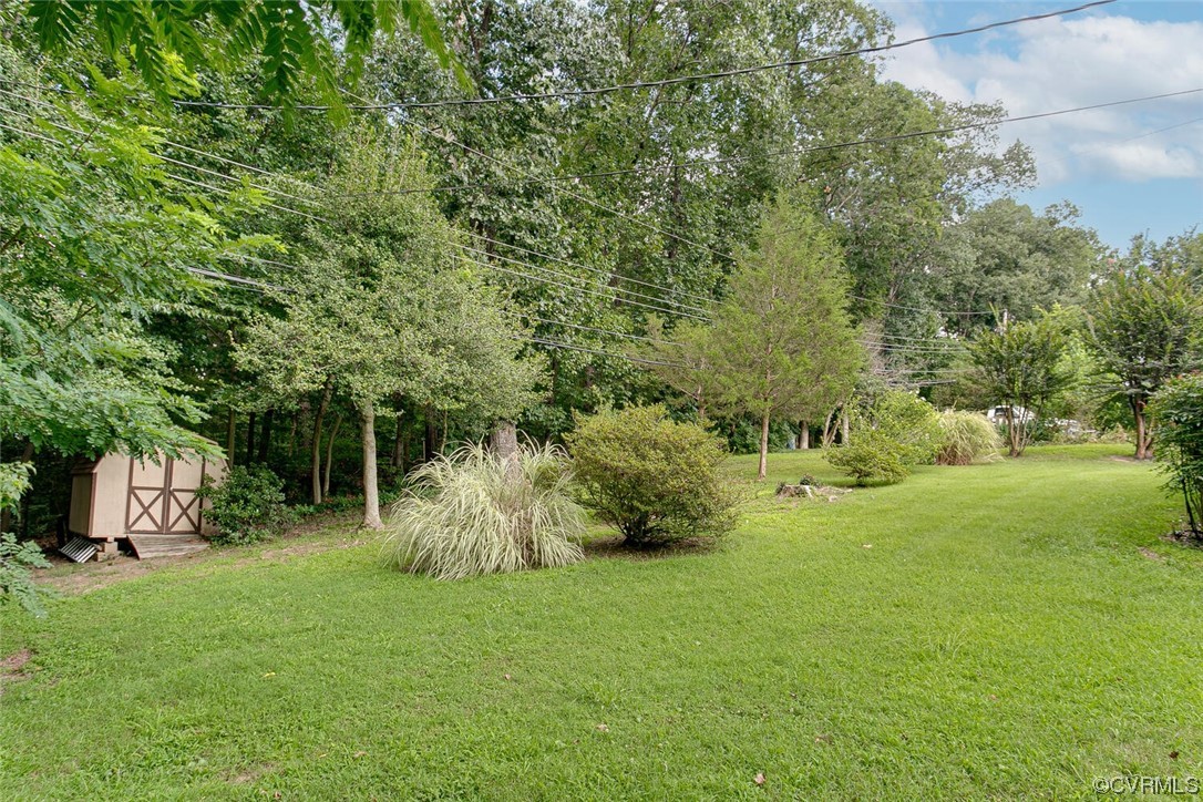 2125 Briarcliff Road Richmond, VA 23225 - Photo 2 of 27 View of yard featuring a storage shed