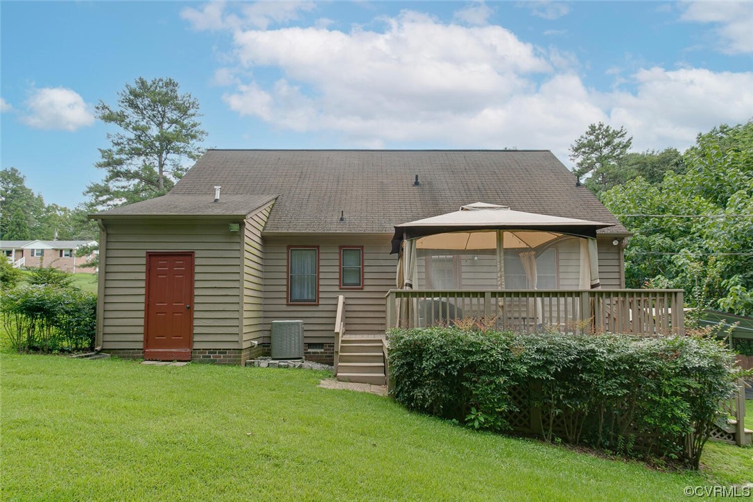 2125 Briarcliff Road Richmond, VA 23225 - Photo 26 of 27 Rear view of house featuring central AC unit, a gazebo, a lawn, and wooden deck