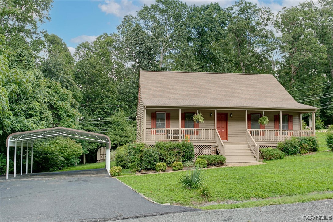 2125 Briarcliff Road Richmond, VA 23225 - Photo 3 of 27 View of front of property featuring a porch and a front yard