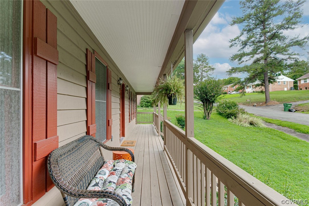 2125 Briarcliff Road Richmond, VA 23225 - Photo 6 of 27 Wooden deck featuring a lawn