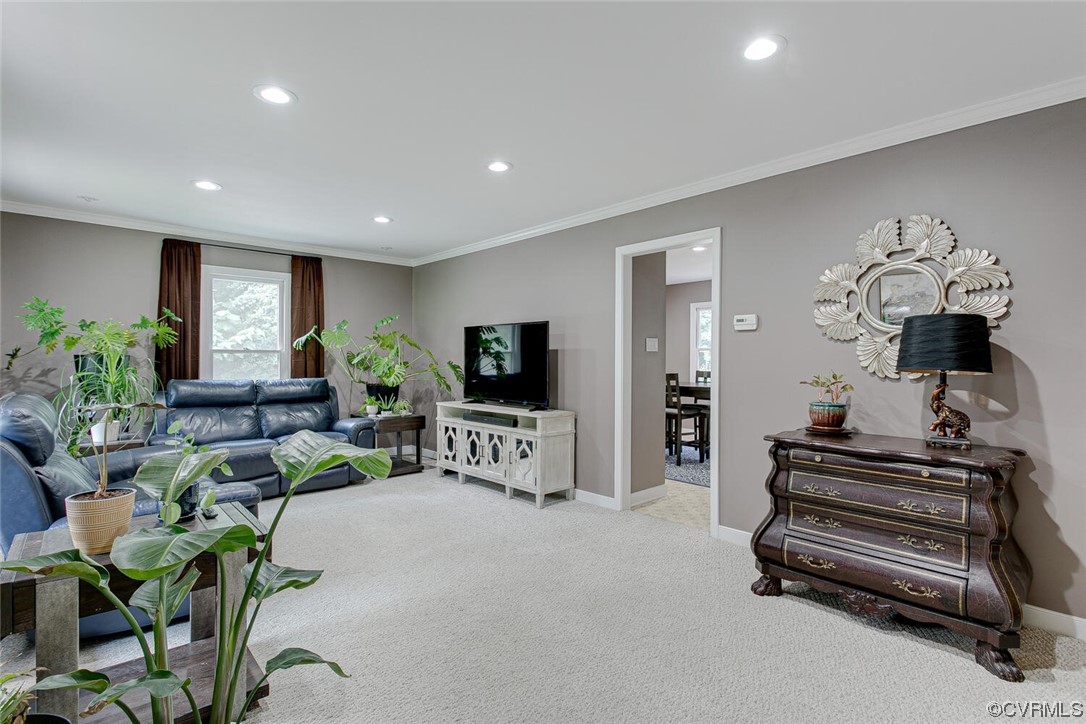 2125 Briarcliff Road Richmond, VA 23225 - Photo 9 of 27 Living room featuring ornamental molding and light carpet