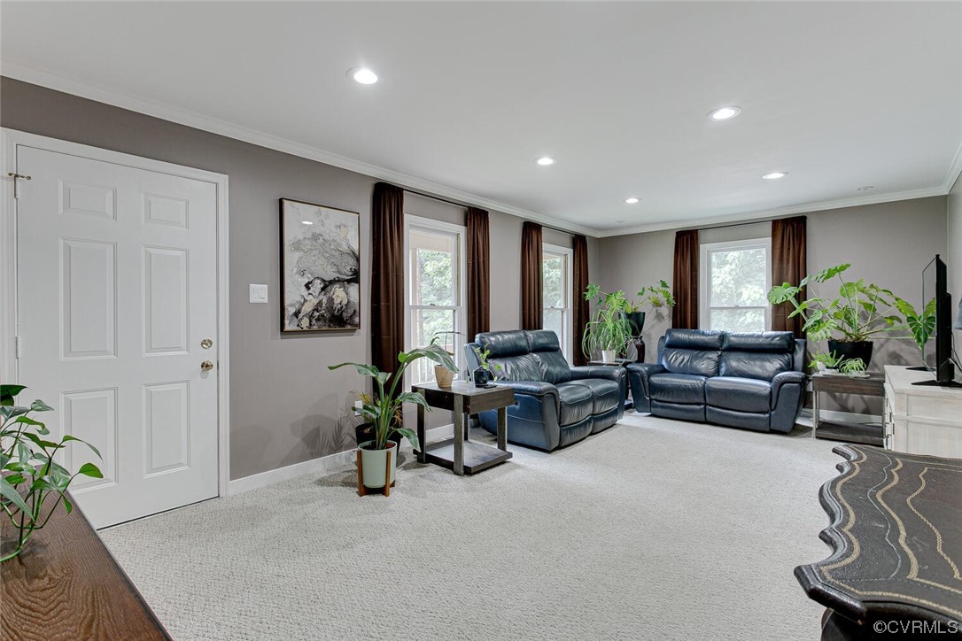 2125 Briarcliff Road Richmond, VA 23225 - Photo 10 of 27 Living room featuring ornamental molding and light carpet