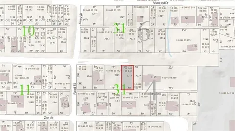 a black and white photo of a white building