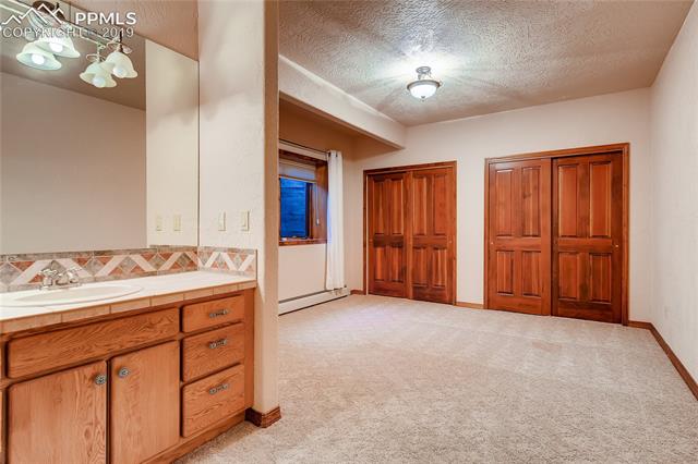 6155 Wilson Road Colorado Springs, CO 80919 - Photo 26 of 35 Basement bedroom #4