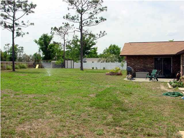 4262 Croydon Road Pensacola, FL 32514 - Photo 14 of 16 1/2 Acre Lot ~ 30x20 Garden ~ Swingset ~ Storage Building