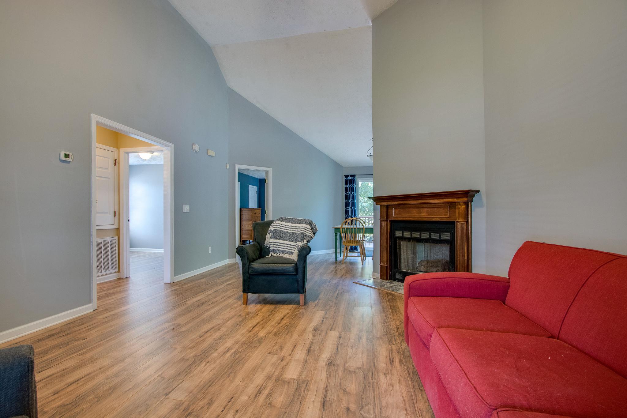111 Pine Grove Road Mount Juliet, TN 37122 - Photo 3 of 18 Soaring ceilings, and fireplace in living room.