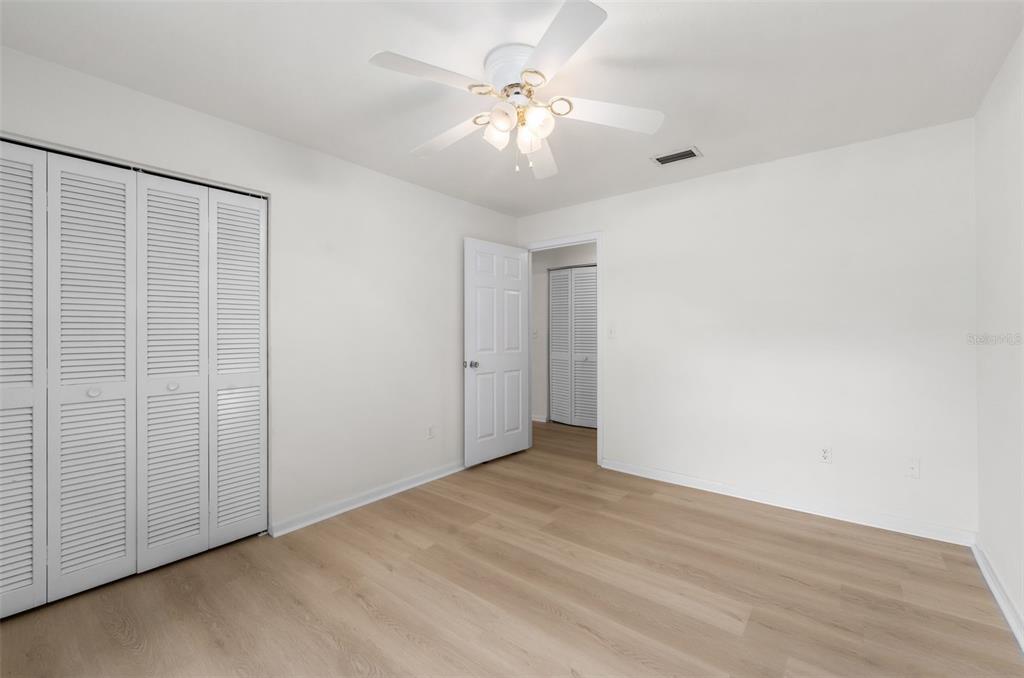 4825 Southwest 19th Street Gainesville, FL 32608 - Photo 20 of 40 a view of an empty room with a window