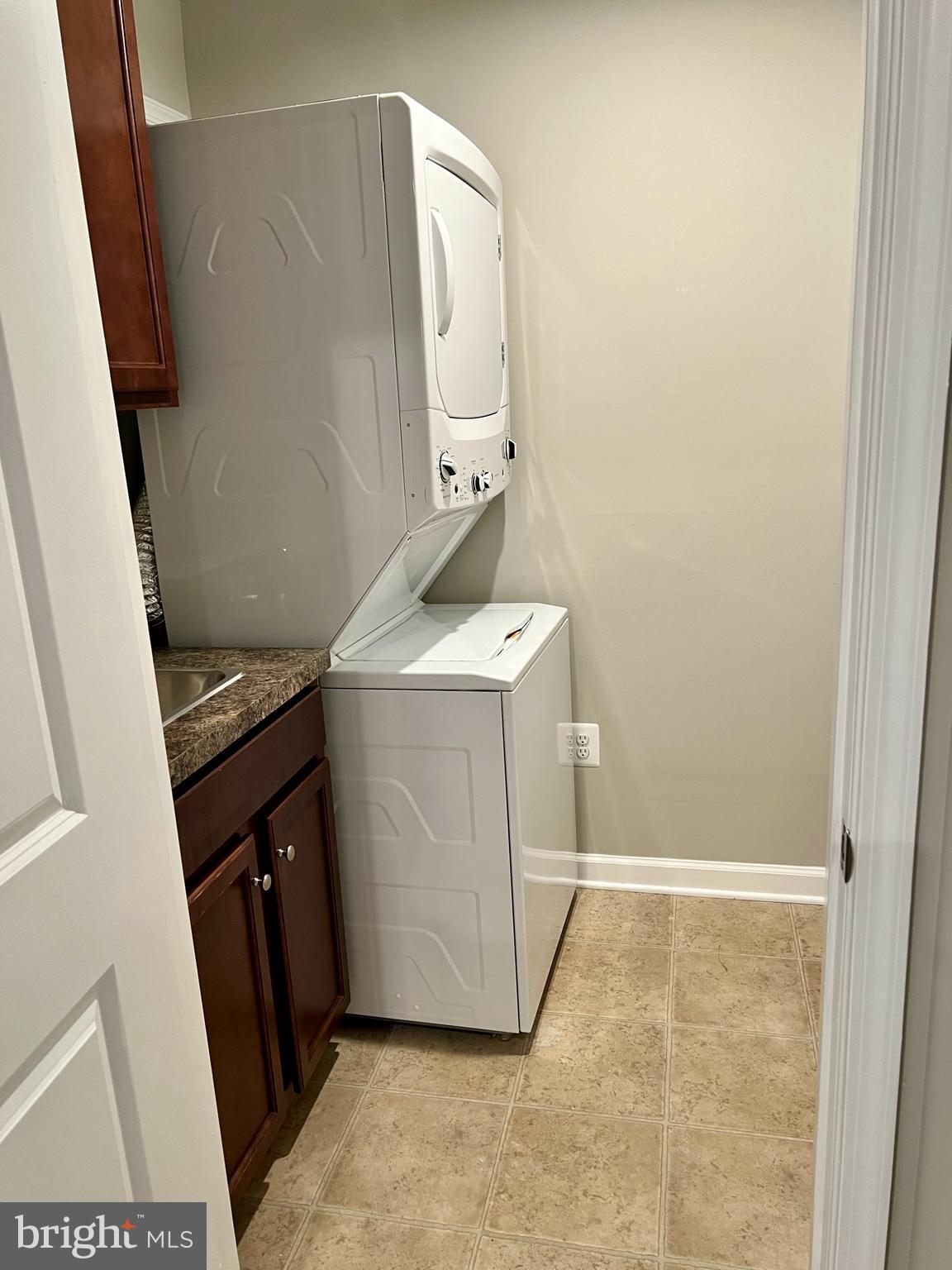 6508 Walcott Lane Frederick, MD 21703 - Photo 21 of 22 a utility room with a sink a washer and dryer