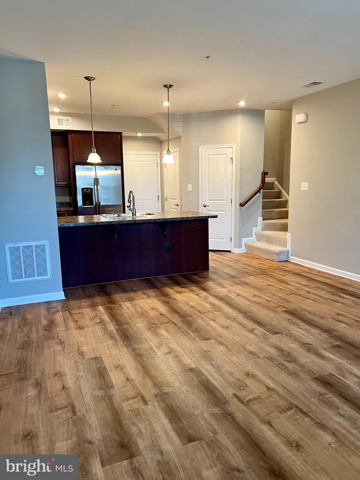 6508 Walcott Lane Frederick, MD 21703 - Photo 22 of 22 a room with a table and chairs