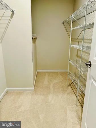 a bathroom with a sink a mirror and a toilet