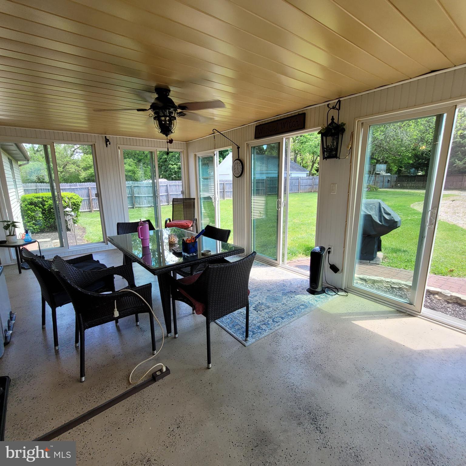 28 East Mill Road Maple Shade, NJ 08052 - Photo 14 of 42 sunroom with 2 sets of sliding glass doors & fan