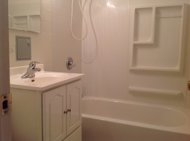 18904 Wolf Road Mokena, IL 60448 - Photo 6 of 10 a bathroom with a sink a toilet and shower