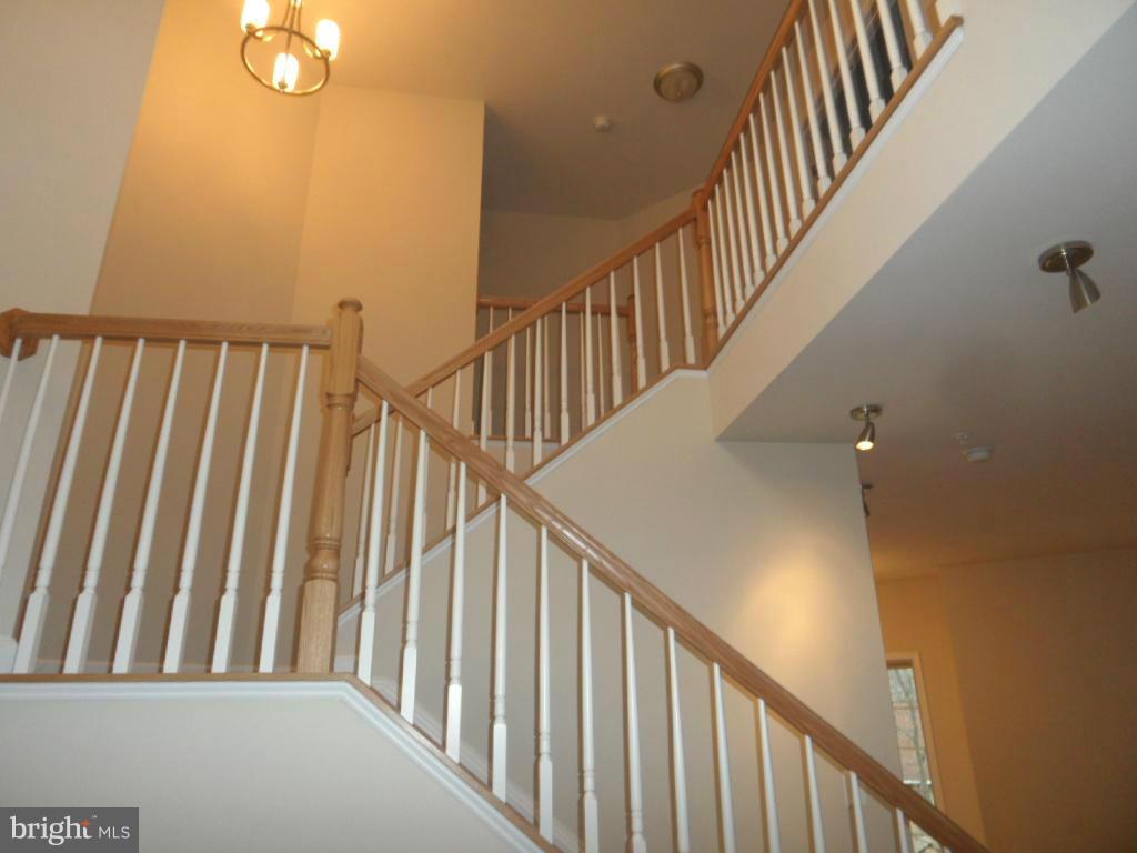 10804 Ridgecrest Place New Market, MD 21774 - Photo 9 of 23 Stairs and hallway from foyer