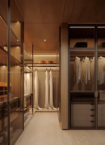 a bedroom with a large bed and a dresser