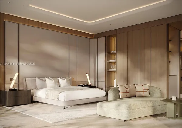 a bedroom with a large bed and a night stand