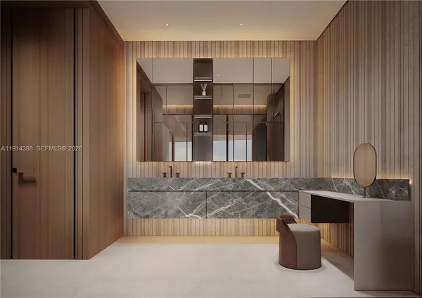 a kitchen with kitchen island cabinets and refrigerator