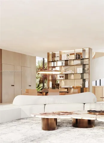 a living room with couches and a dining table with wooden floor