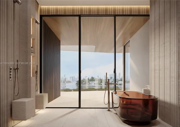 a living room with a glass window and a glass door