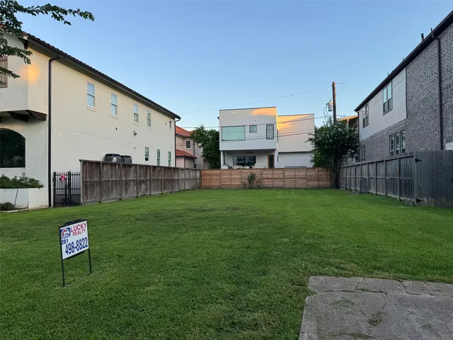a house view with a sitting space and garden