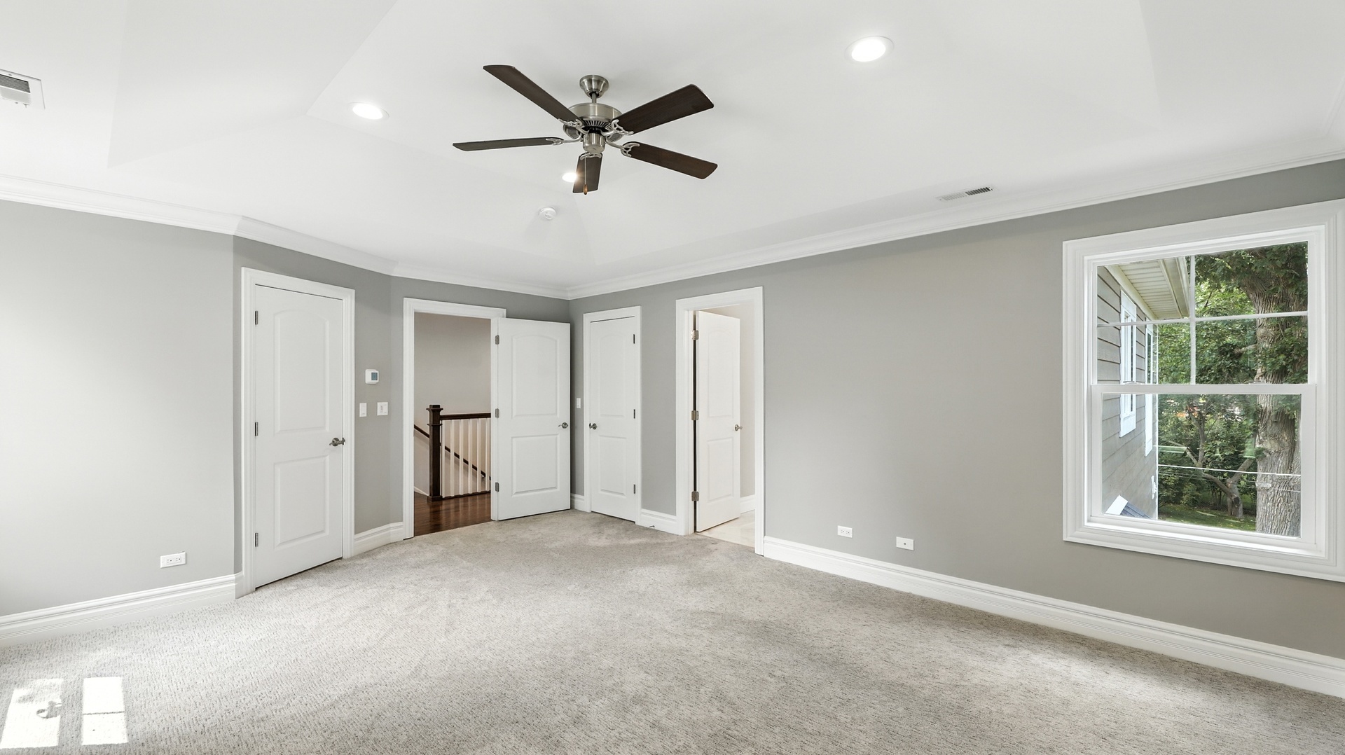 1127 Kenton Road Deerfield, IL 60015 - Photo 13 of 32 a view of a livingroom with a ceiling fan and window