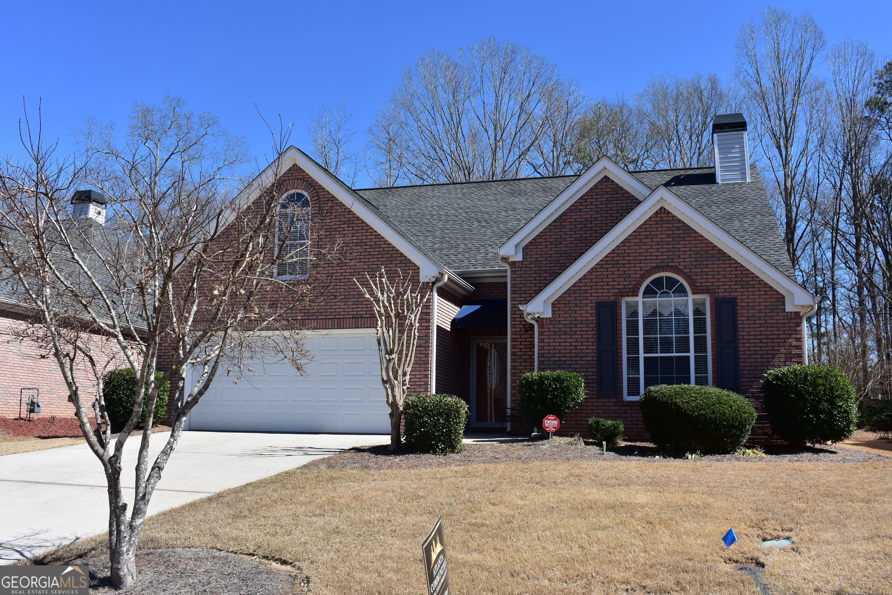213 Meridian Drive Stockbridge, GA 30281 - Photo 1 of 1 a front view of a house with garden