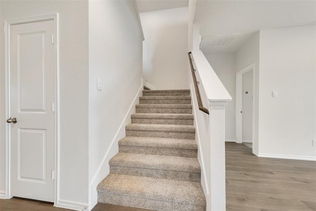 1428 Millstead Rill Drive Caddo Mills, TX 75135 - Photo 22 of 24 a view of an entryway with wooden floor