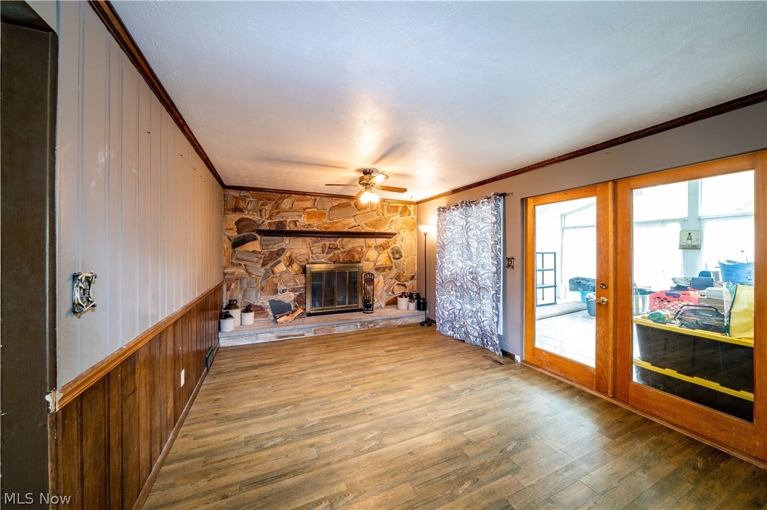 3754 Vira Road Stow, OH 44224 - Photo 11 of 35 3754 Vira Rd, Stow, OH 44224 won't last long! 4 Bedrooms & full bath on the 2nd floor as well as half bath on the 1st floor, separate Living Room, Family Room with beautiful Fireplace, gorgeous Sunroom with sliding doors to the huge deck with fenced rear yard & tool shed, Kitchen & Dining Room with wood floors; Full basement with half finished for recreation Room & other half as workshop & Hobby area as well as Laundry Hookups & Utilities.