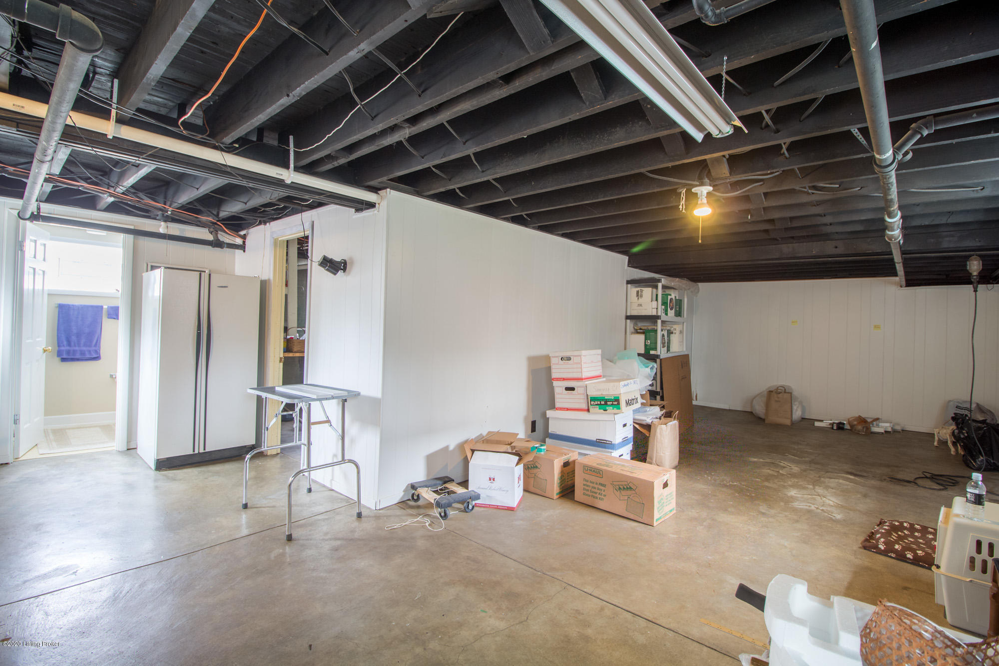 518 Emery Road Louisville, KY 40206 - Photo 30 of 31 Unfinished basement with ceilings painted black. B-dry system has been installed
