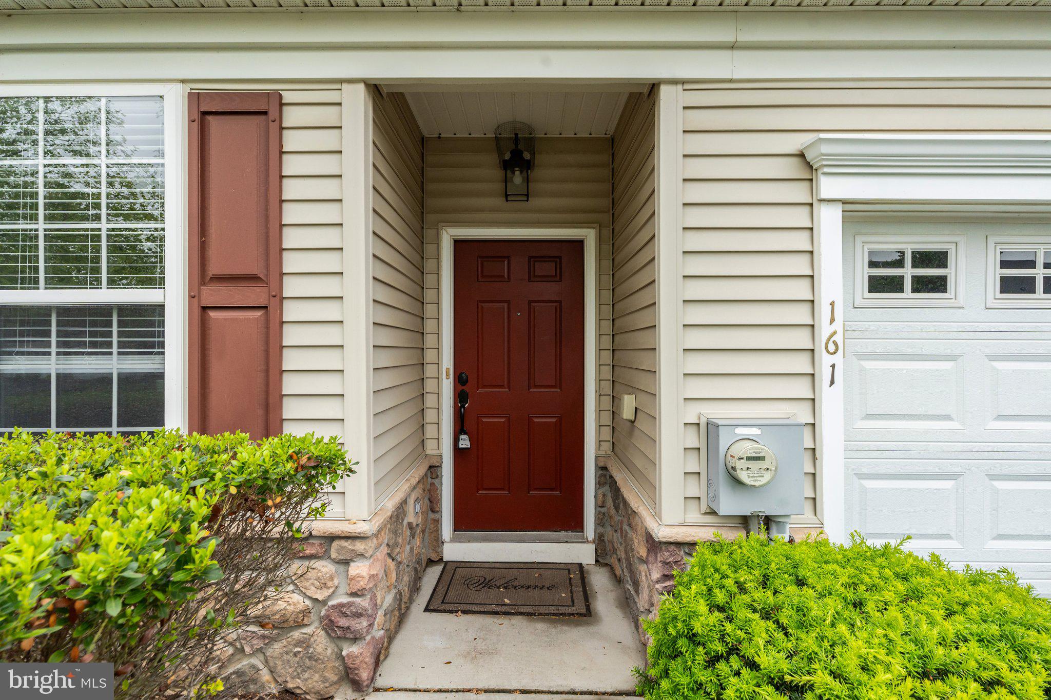 161 Stoyer Road Coatesville, PA 19320 - Photo 1 of 52 Charming entryway with vibrant greenery.