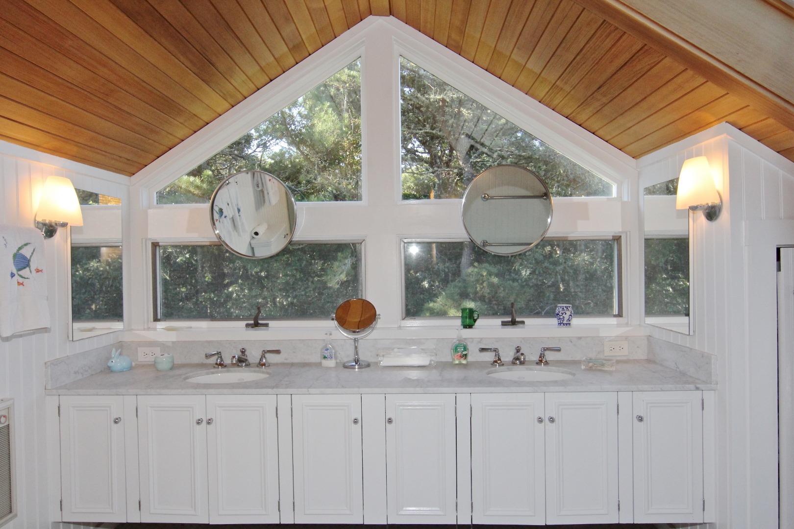7 Green Hollow Road Edgartown, MA 02539 - Photo 34 of 53 a bathroom with a sink and mirror with window
