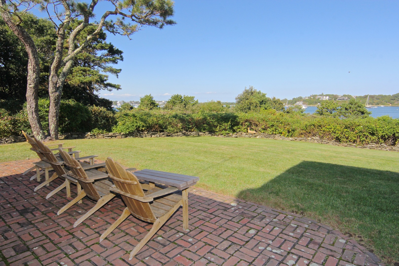 7 Green Hollow Road Edgartown, MA 02539 - Photo 40 of 53 a view of a lake with a mountain