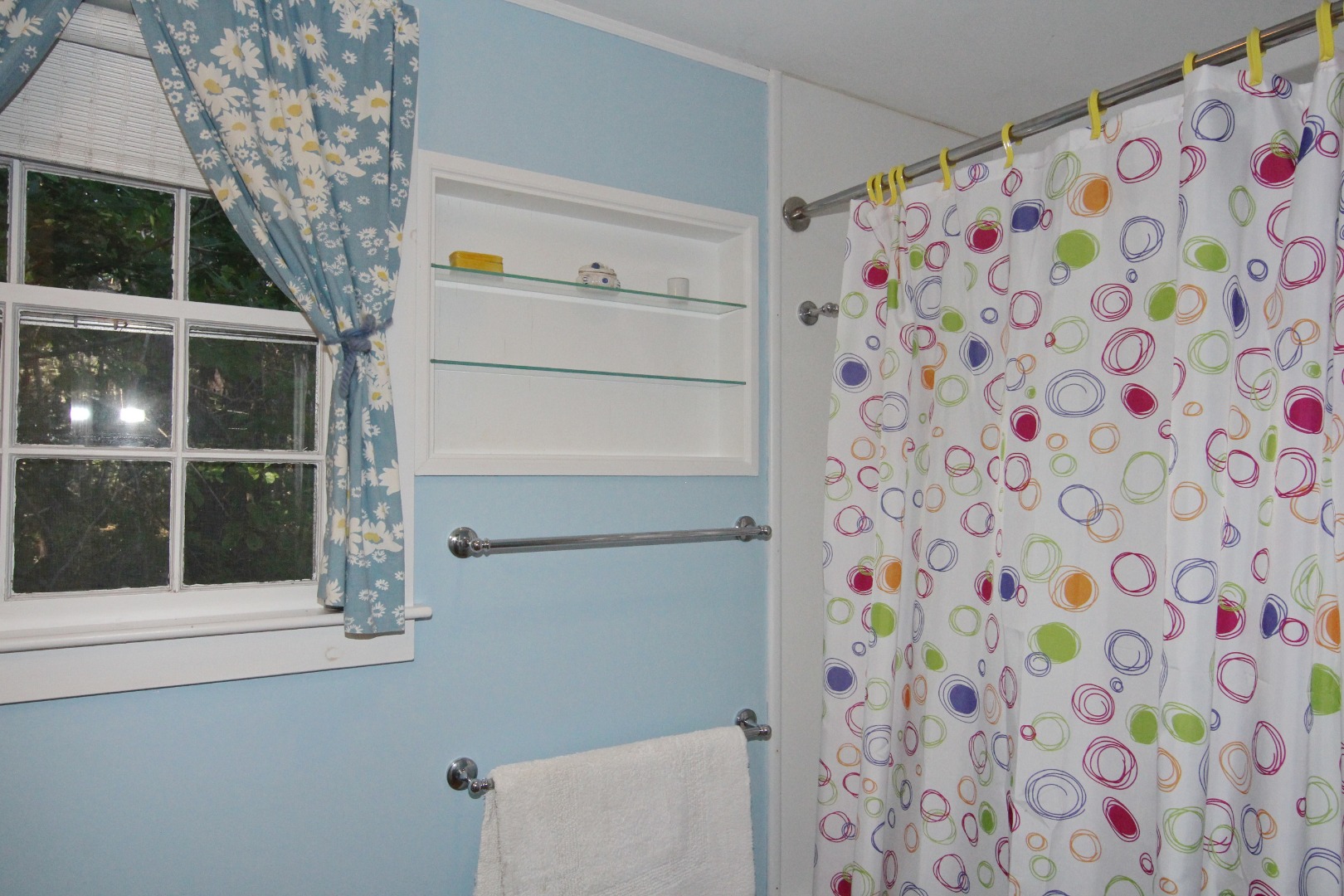 7 Green Hollow Road Edgartown, MA 02539 - Photo 45 of 53 a view of bathroom with baby crib and a shower curtain