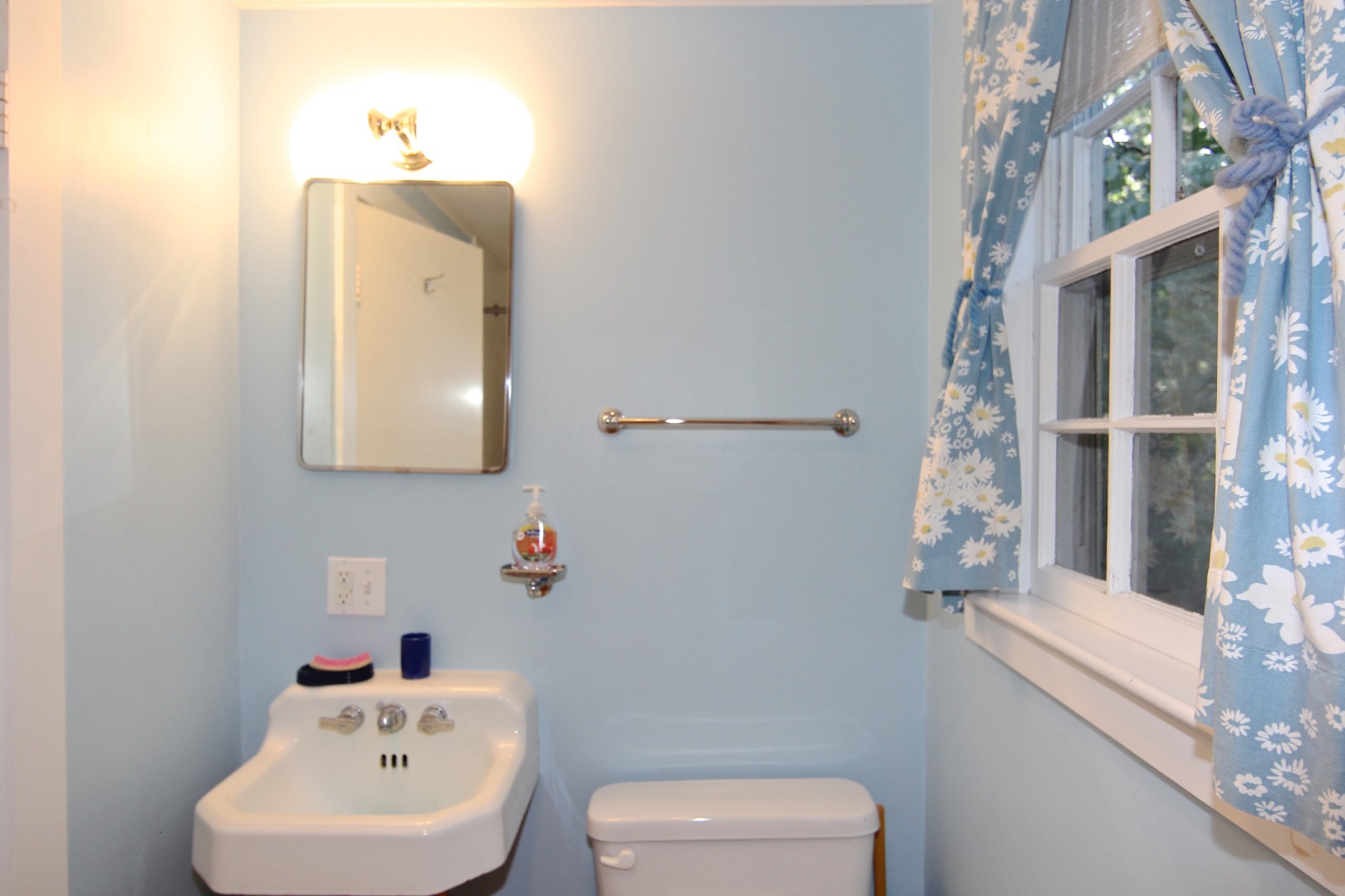 7 Green Hollow Road Edgartown, MA 02539 - Photo 46 of 53 a bathroom with a toilet sink and mirror