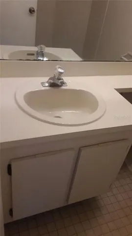 a view of a chairs and table in patio