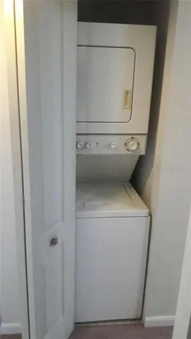 a view of a lake in between two chairs