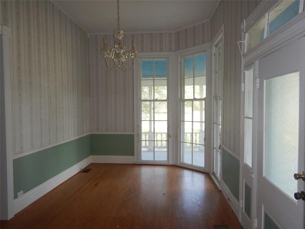 533 Holly Street Grand Cane, LA 71032 - Photo 2 of 15 a view of a room with window and wooden floor