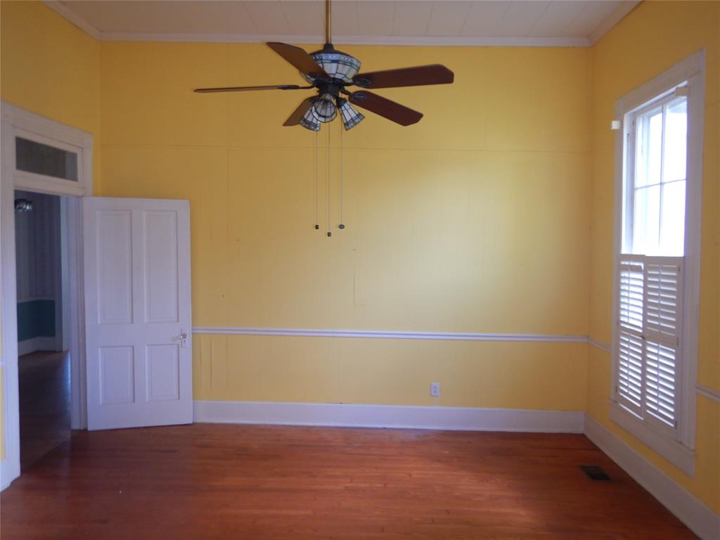 533 Holly Street Grand Cane, LA 71032 - Photo 10 of 15 an empty room with a window and a ceiling fan
