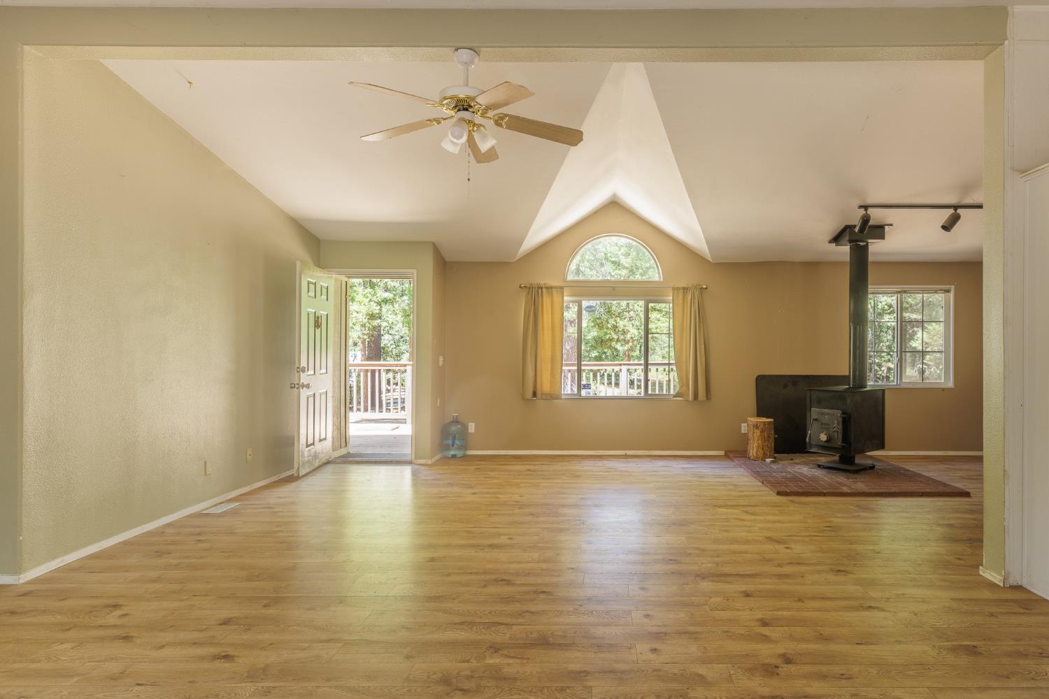 7140 Darling Cabin Road Garden Valley, CA 95633 - Photo 12 of 34 a view of an empty room with a window