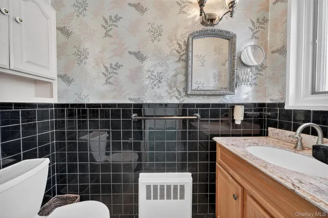 a view of a house with a snow in a yard