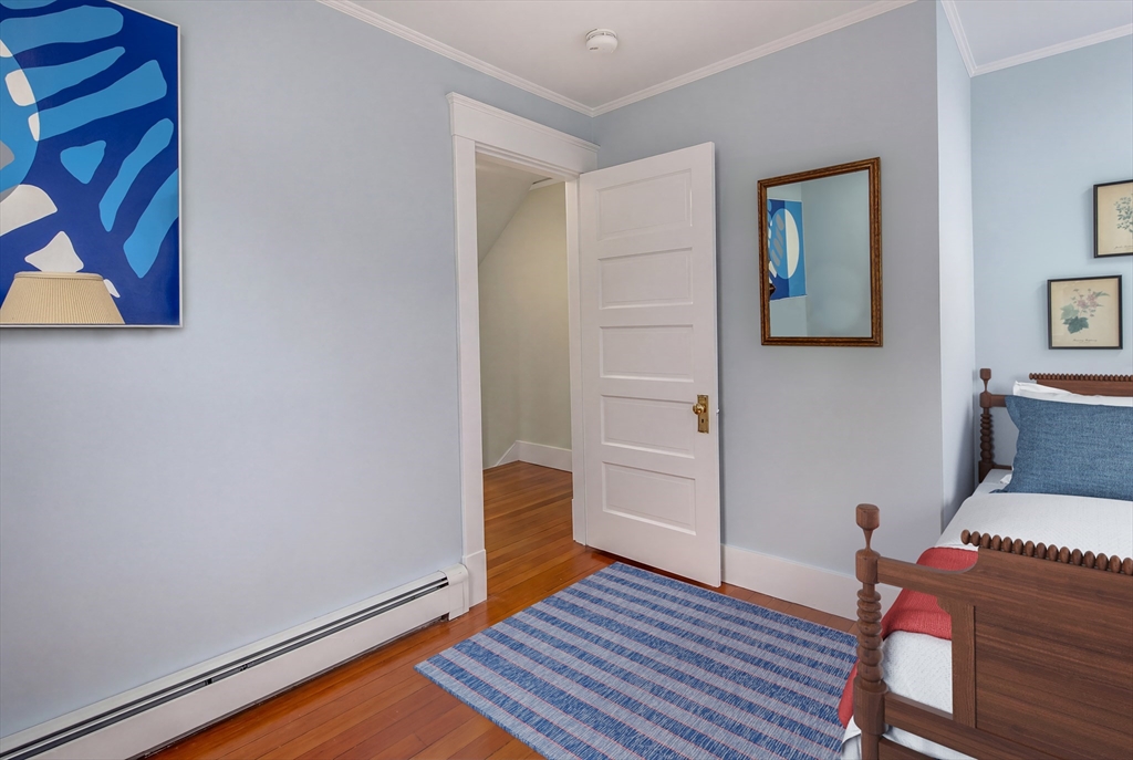 329 Front Street Marion, MA 02738 - Photo 33 of 42 a room with wooden floor and furniture
