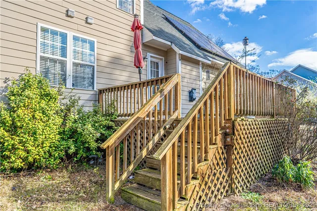 a view of road with large trees
