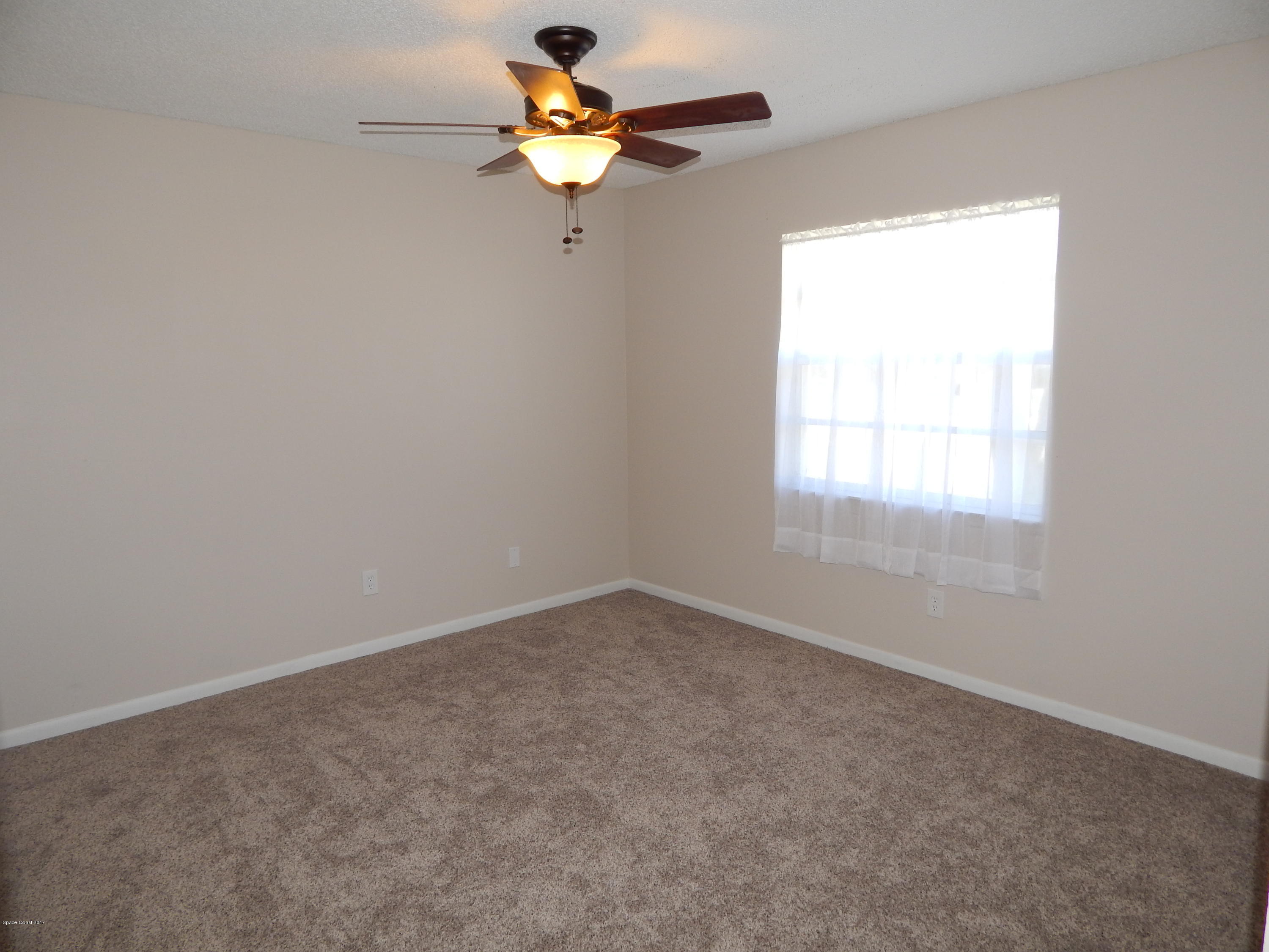 1921 Tallridge Road Melbourne, FL 32935 - Photo 14 of 20 Bedroom 3
