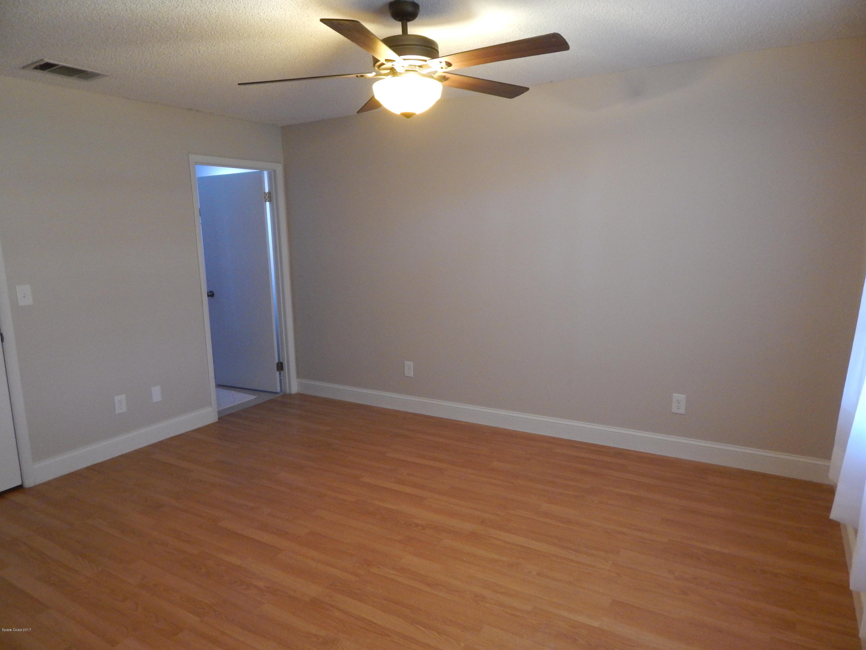 1921 Tallridge Road Melbourne, FL 32935 - Photo 9 of 20 Master Bedroom
