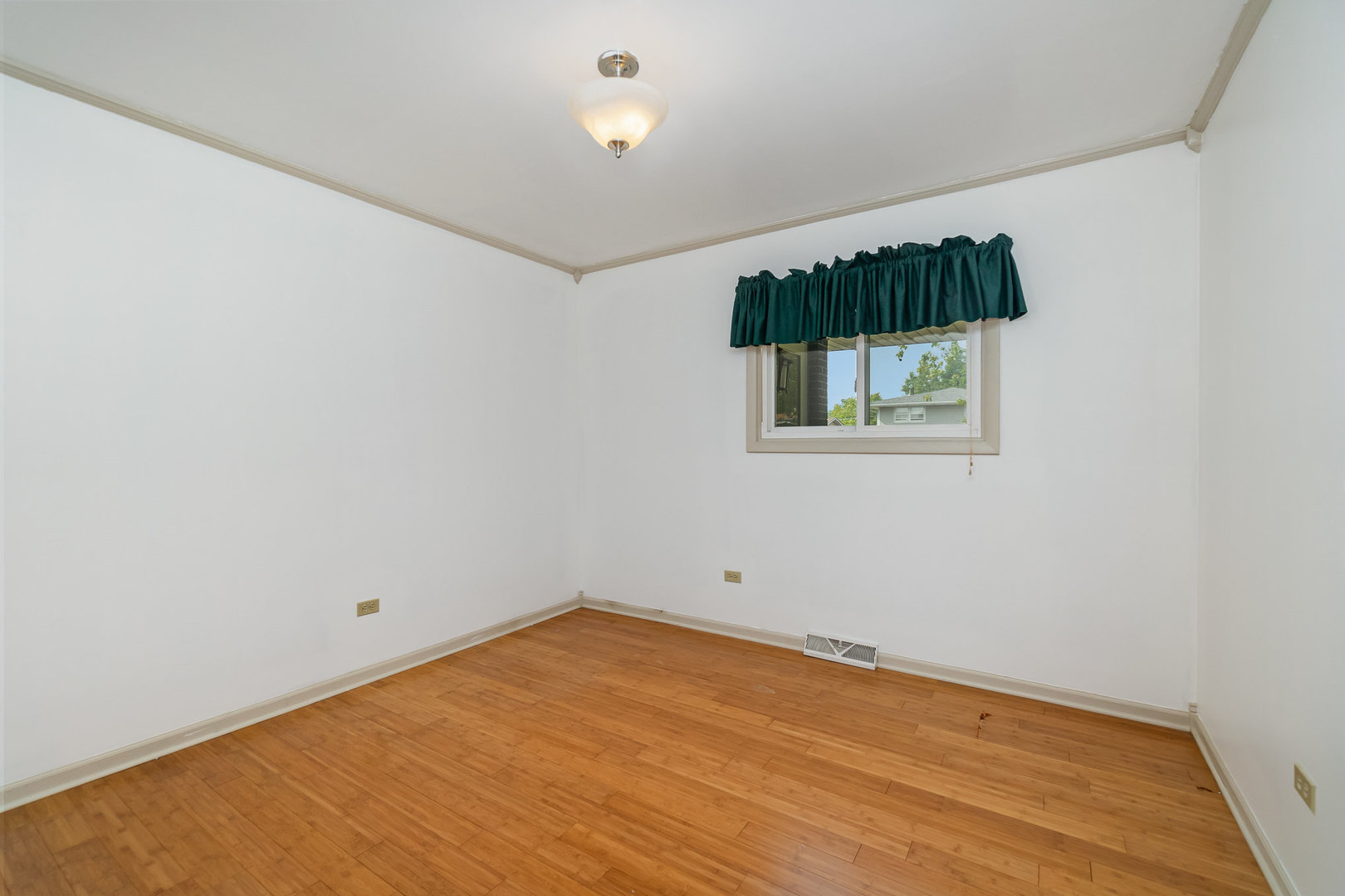 2831 193rd Street Lansing, IL 60438 - Photo 13 of 28 an empty room with a window
