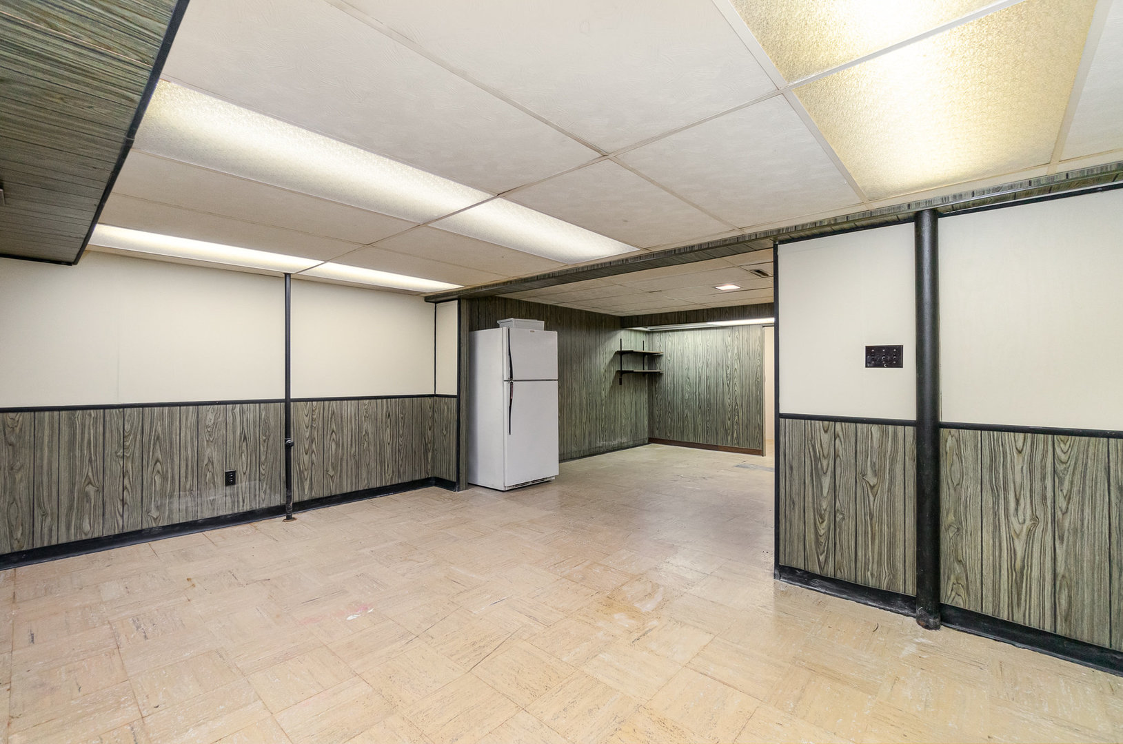 2831 193rd Street Lansing, IL 60438 - Photo 19 of 28 a view of an empty room with wooden floor