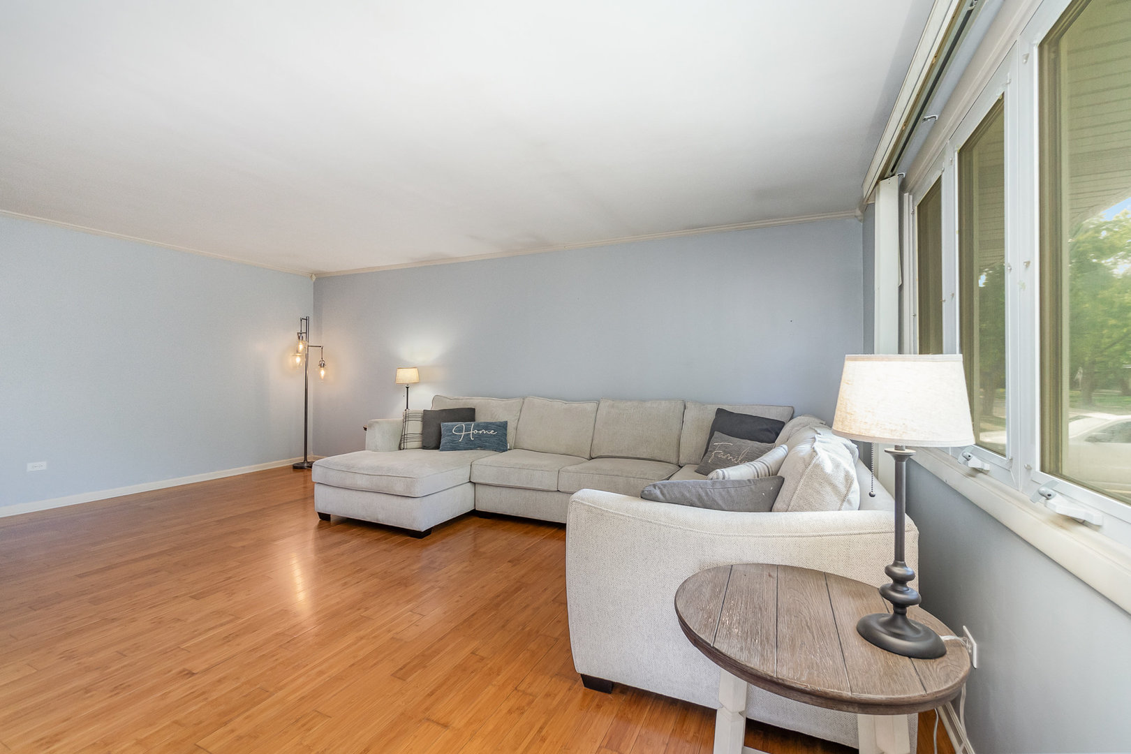 2831 193rd Street Lansing, IL 60438 - Photo 4 of 28 a living room with furniture and a table